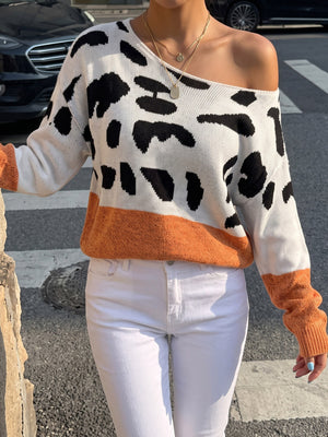 white pullover sweater with cow-print and off-shoulder