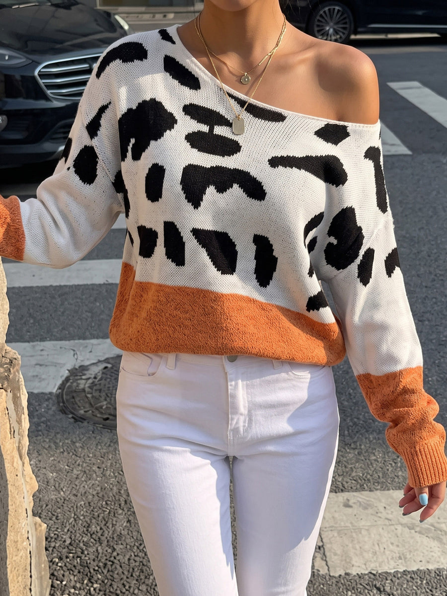 white pullover sweater with cow-print and off-shoulder