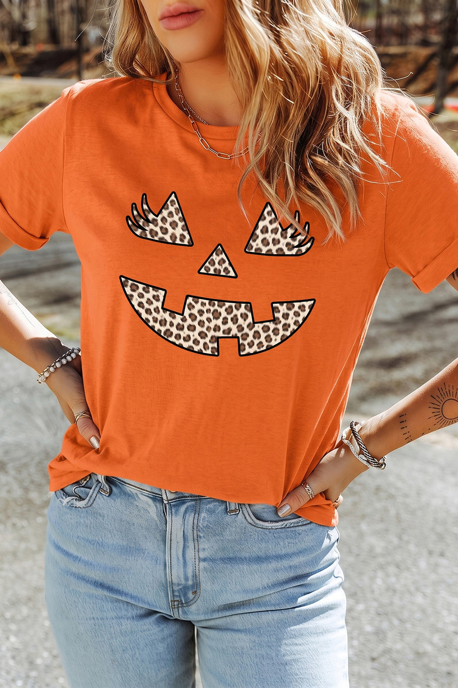 orange t-shirt with graphic and crew neck