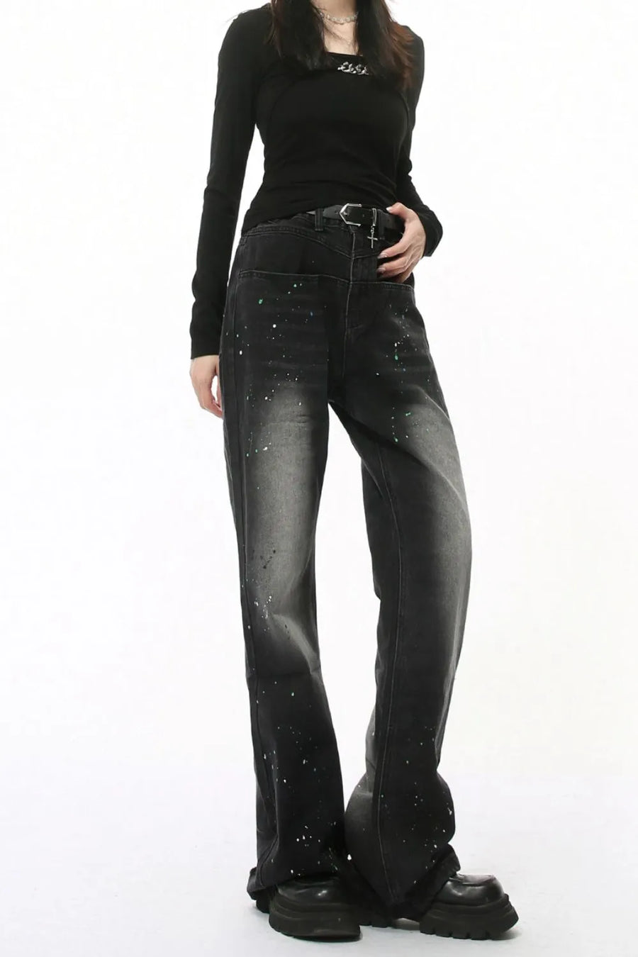 Dark wash flare jeans with splatter detail and double waistline.