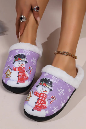 Purple snowman print faux fur lined slippers with snowflake pattern.
