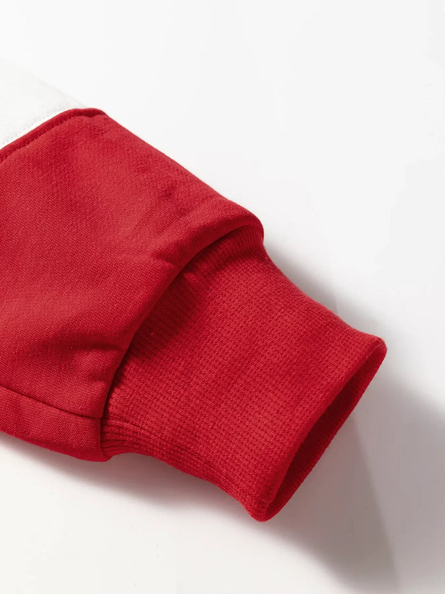 Scarlet drop shoulder sweatshirt cuff detail, ribbed knit sleeve hem.