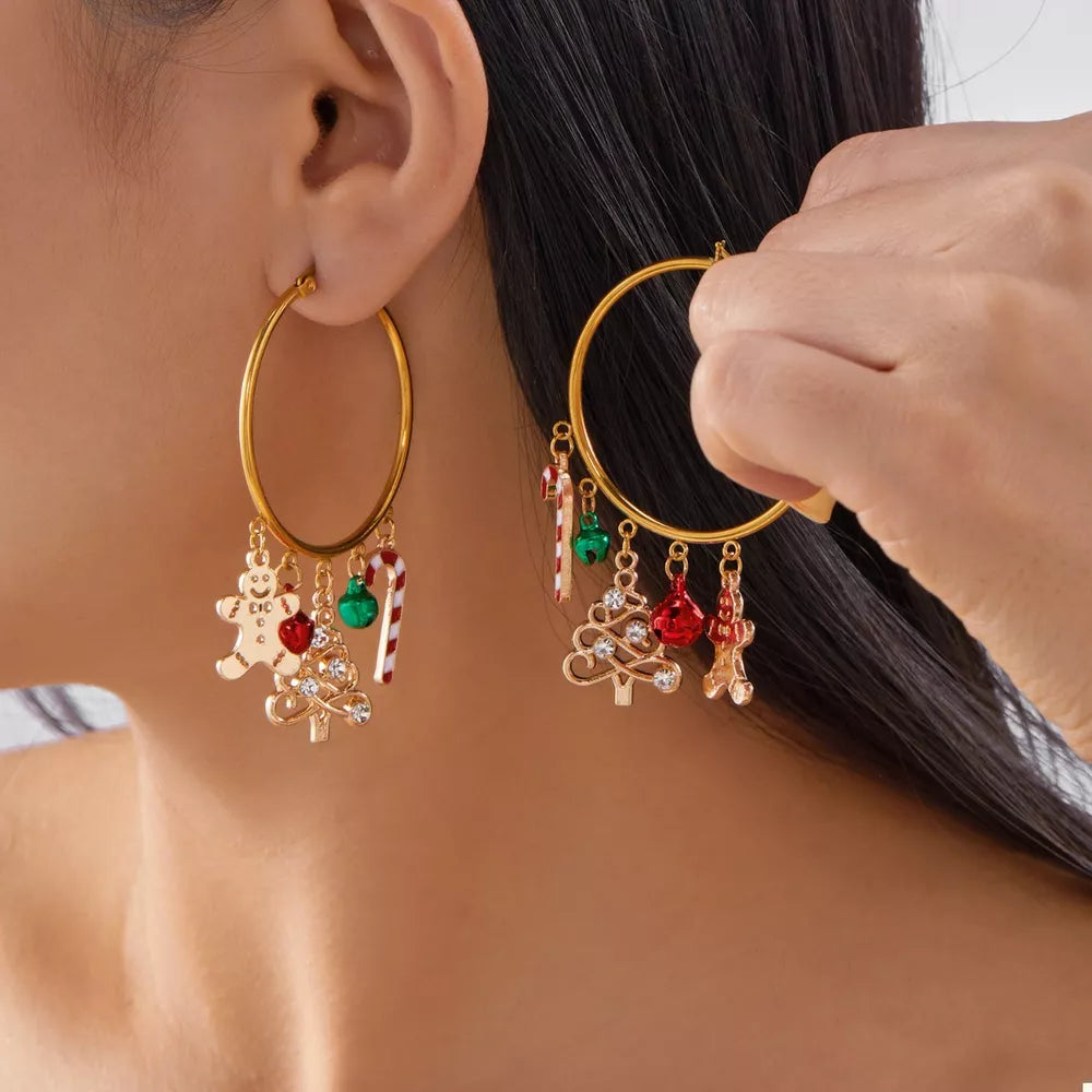 gold earrings with christmas-themed charms and N/A