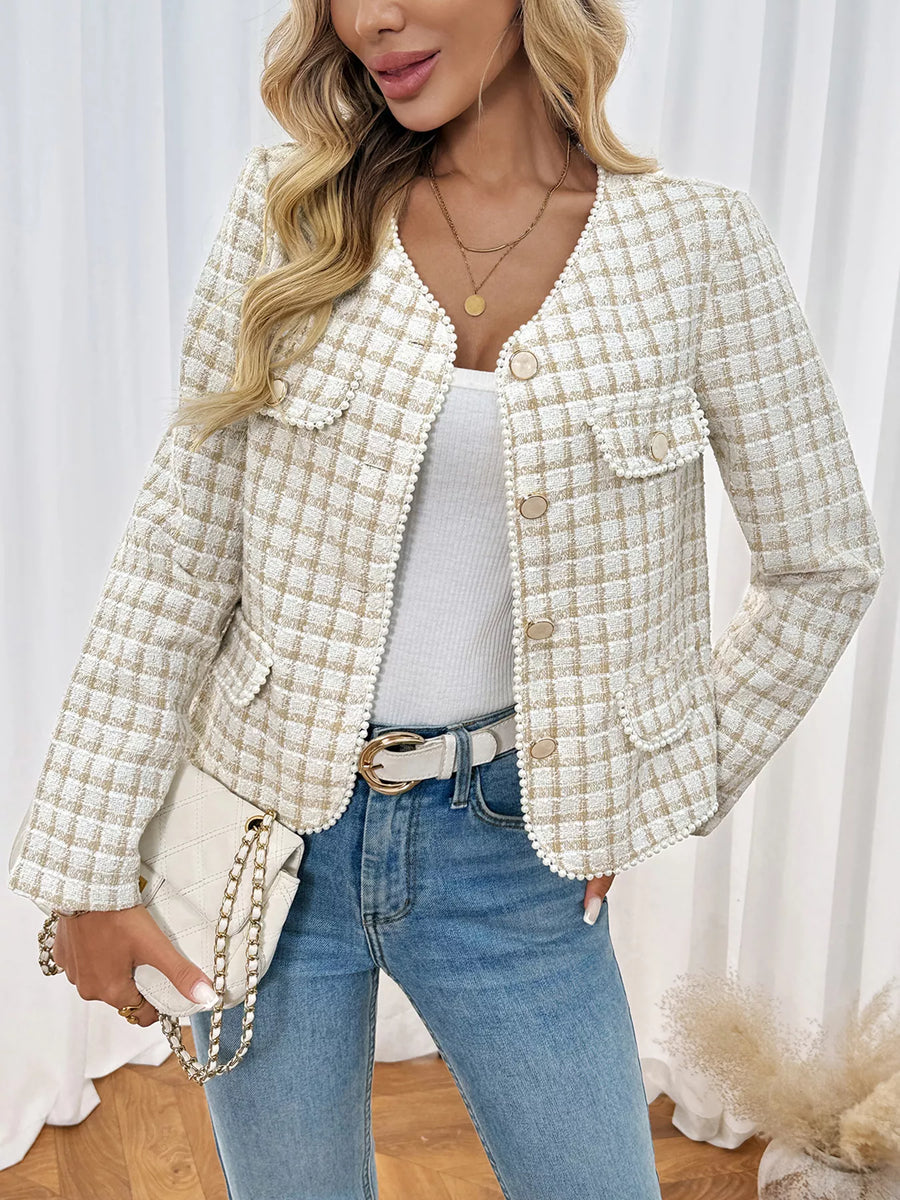 Apricot tweed jacket with pearl trim and button front, styled with jeans.
