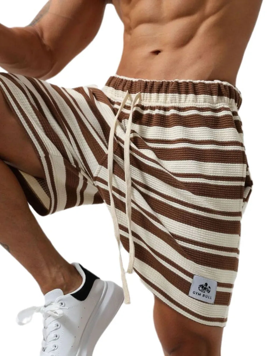 Brown and cream striped textured drawstring jogger shorts with a white drawstring.