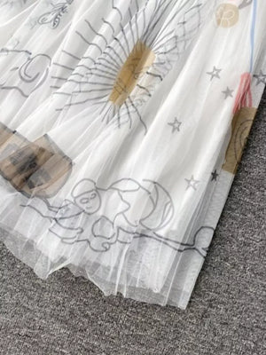 White tulle skirt with whimsical sunburst and abstract line art print