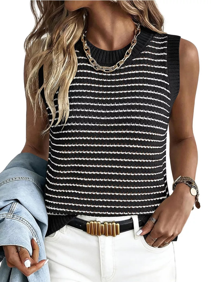 Textured striped knit sweater vest in black and white with a crew neck.