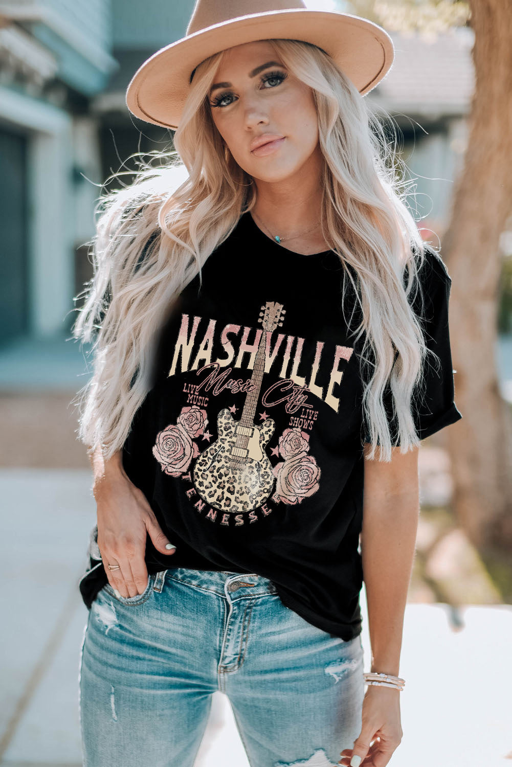 Black t-shirt with Nashville Music City graphic, guitar, roses and distressed denim.