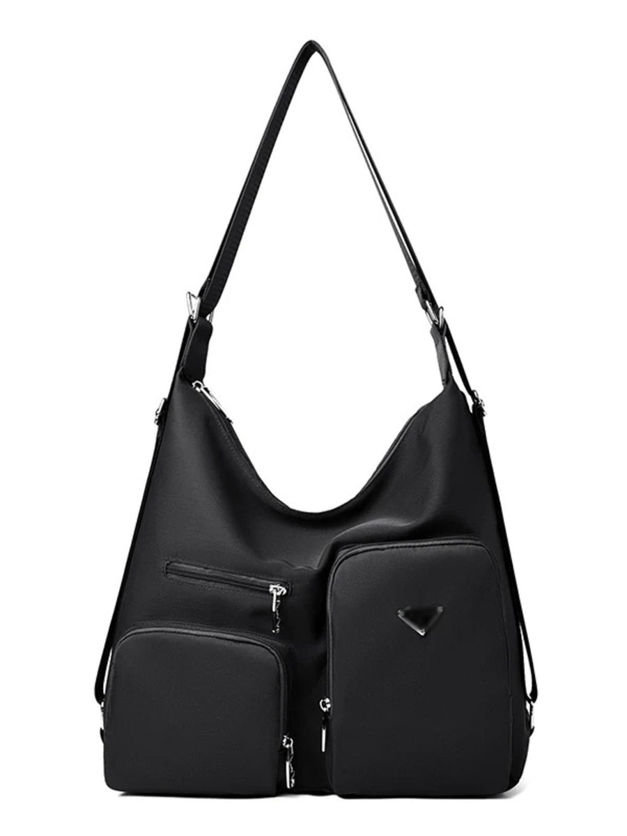 Black nylon shoulder bag with multiple exterior pockets and silver hardware.