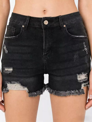 Black distressed denim shorts with raw hem and button fly.