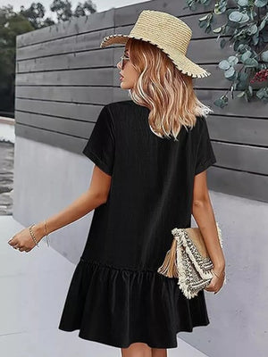 coastal mini dress in Beige with v-neck