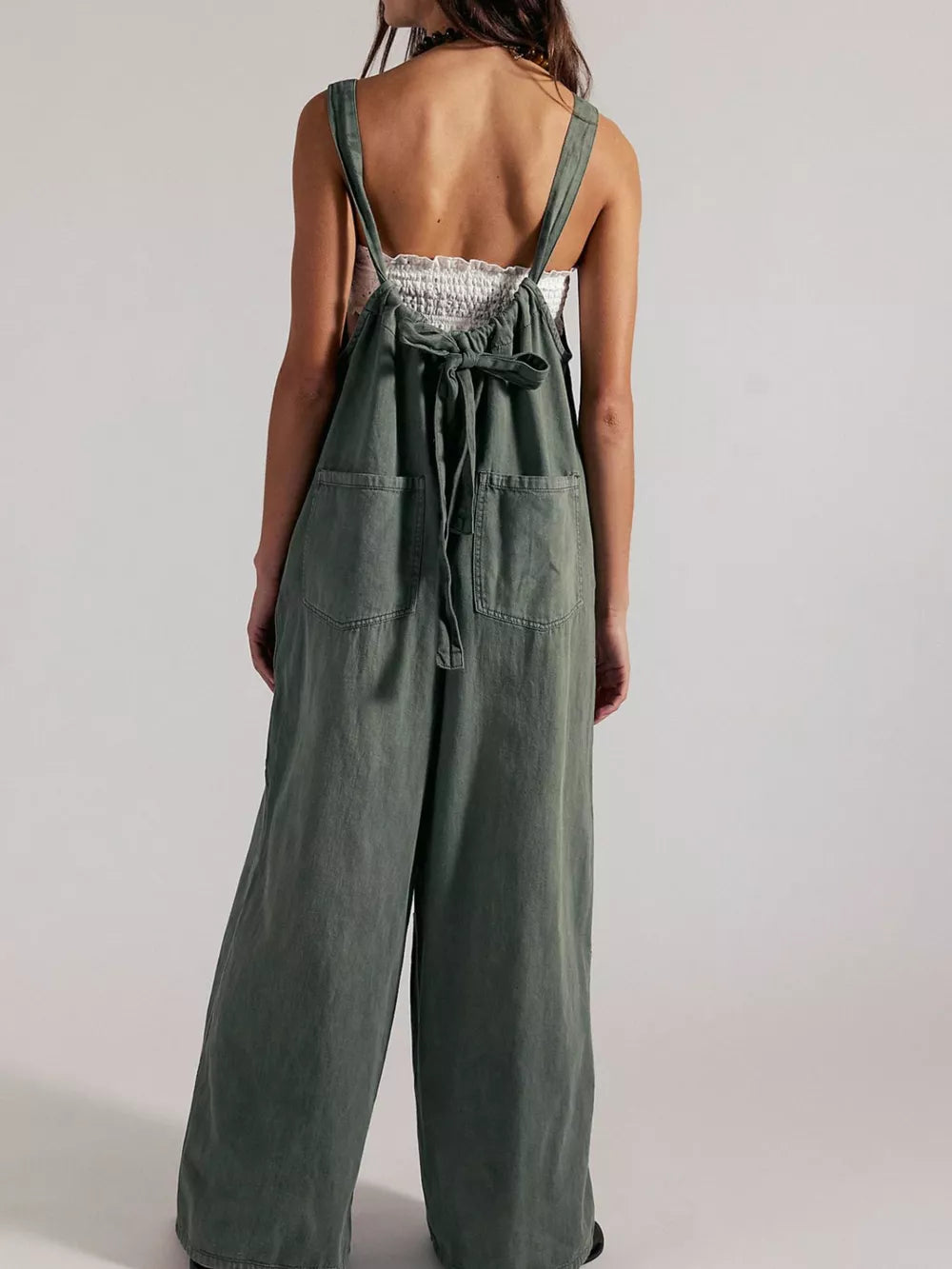 100% polyester Care instructions: Machine wash cold jumpsuit in Orange with loose silhouette