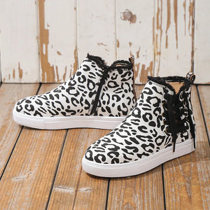 Canvas leopard print zip-up sneaker booties with black laces and faux fur trim.