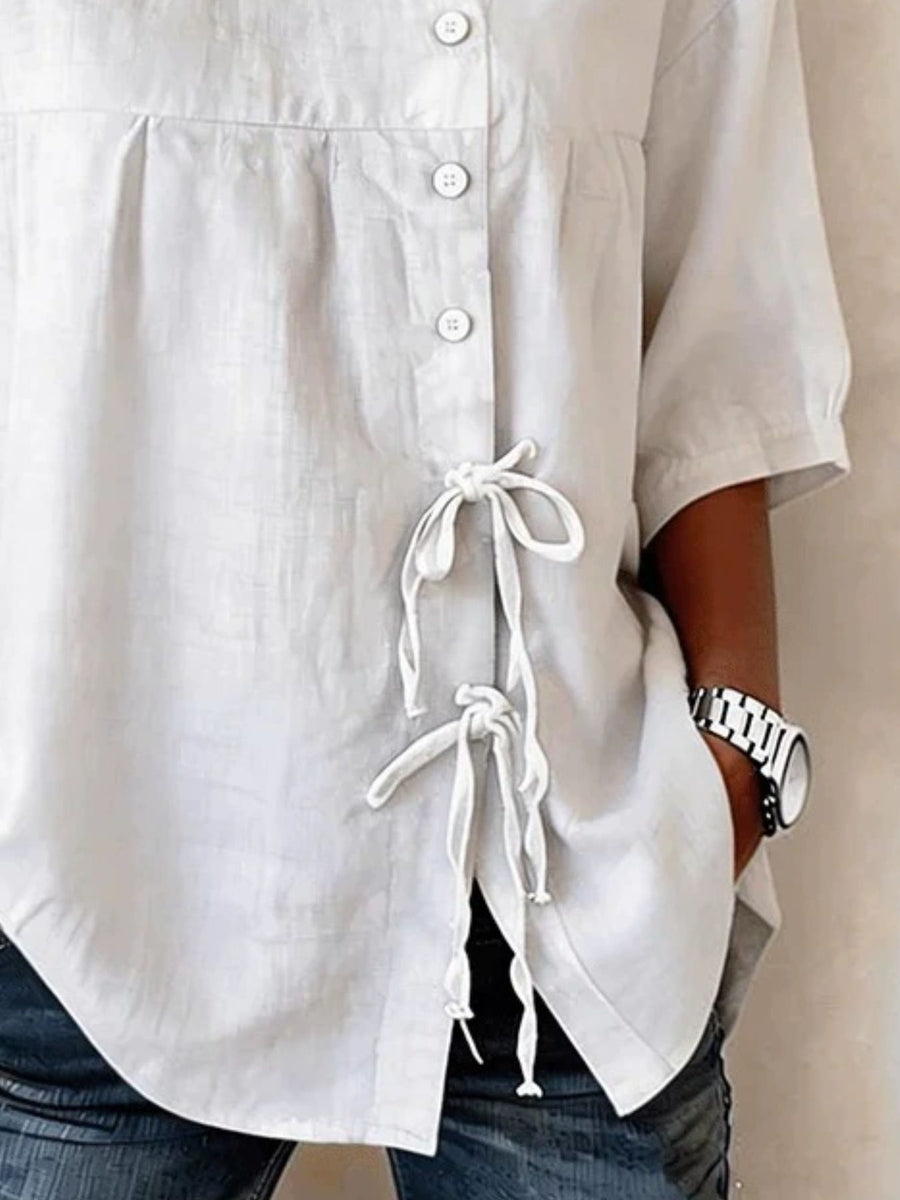 100% polyester Care instructions: Machine wash cold blouse in Light Blue with relaxed silhouette