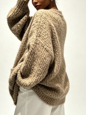Cream cardigan with hip-length and button-front