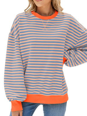 Striped crew neck sweatshirt in blue and coral with orange cuffs and hem.