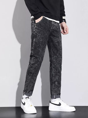 light gray jeans featuring pocketed and acid wash