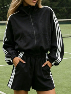 Red track jacket with drawstring and long sleeve