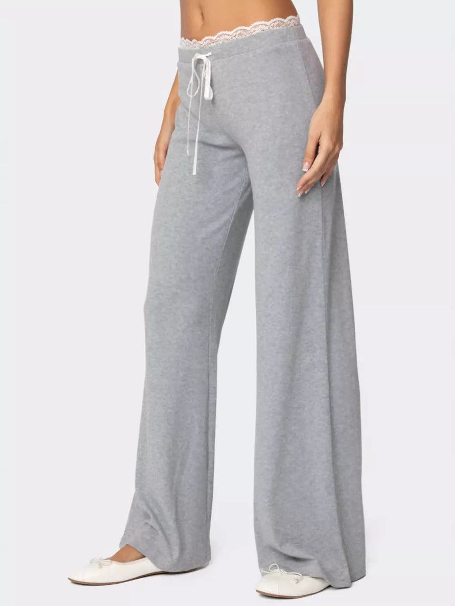 Grey wide leg pants with lace trim waistband and drawstring detail