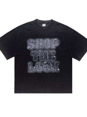 Black acid-wash cotton t-shirt with "SHOP THE LOOK" graphic print