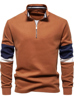 Caramel colorblock zip-neck sweatshirt with navy and white sleeve details.