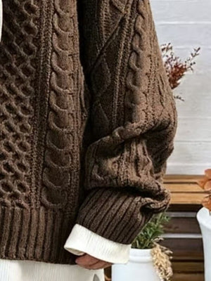 Brown pullover sweater featuring cable-knit and cable knit