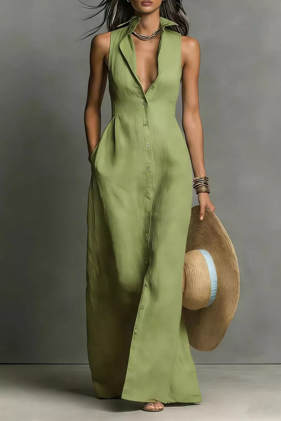 Sage green sleeveless maxi dress with button front and pockets