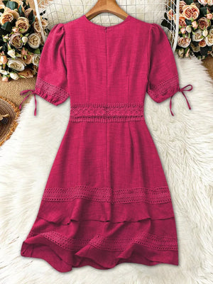 Rose Red lace-embellished V-neck mini dress with puff sleeves and tiered hem.
