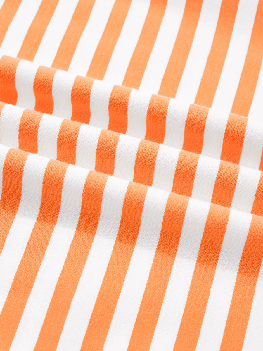 Oversized cotton t-shirt with orange and white stripes, 3/4 sleeves.