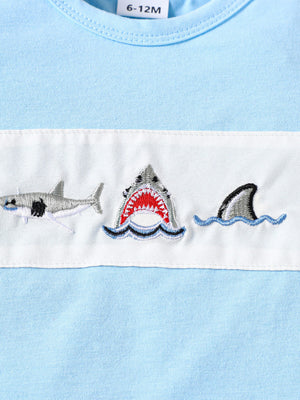 Baby blue cotton t-shirt with embroidered sharks and waves detail