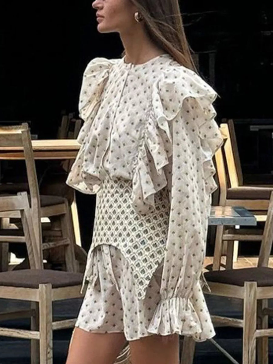 White printed mini dress with ruffles and puff sleeves