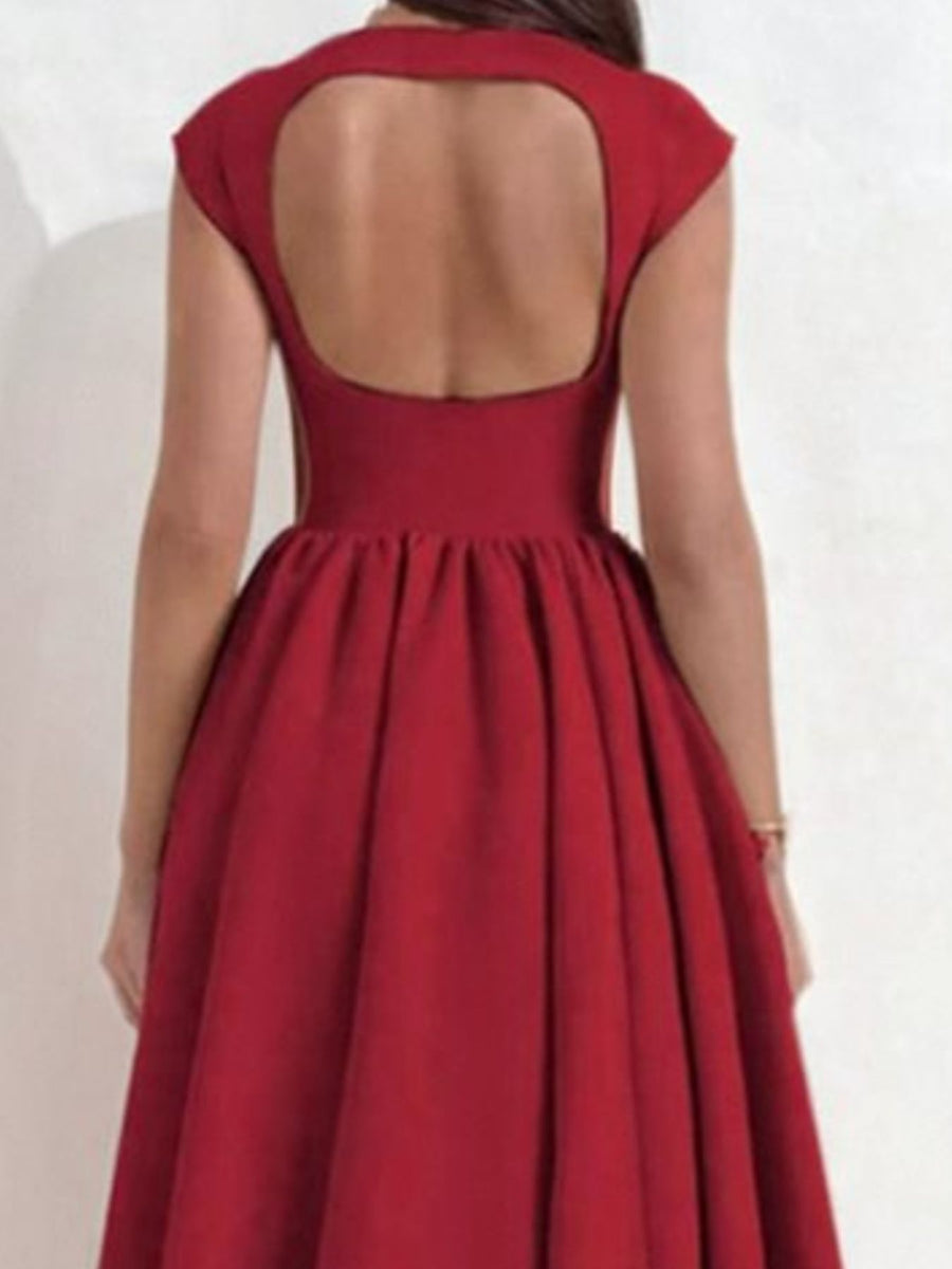 Deep red cap sleeve a-line midi dress with a back cutout and boat neck.