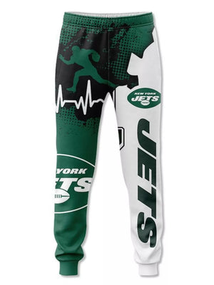 New York Jets green and white graphic print sweatpants with football player and heartbeat design.