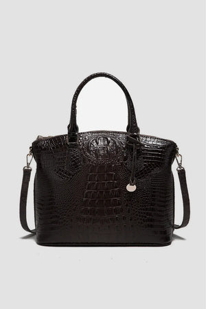 Black crocodile embossed satchel bag with shoulder strap and top handles