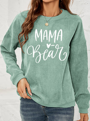 Textured corduroy sweatshirt in Gum Leaf with white Mama Bear graphic, crew neck, long sleeves.