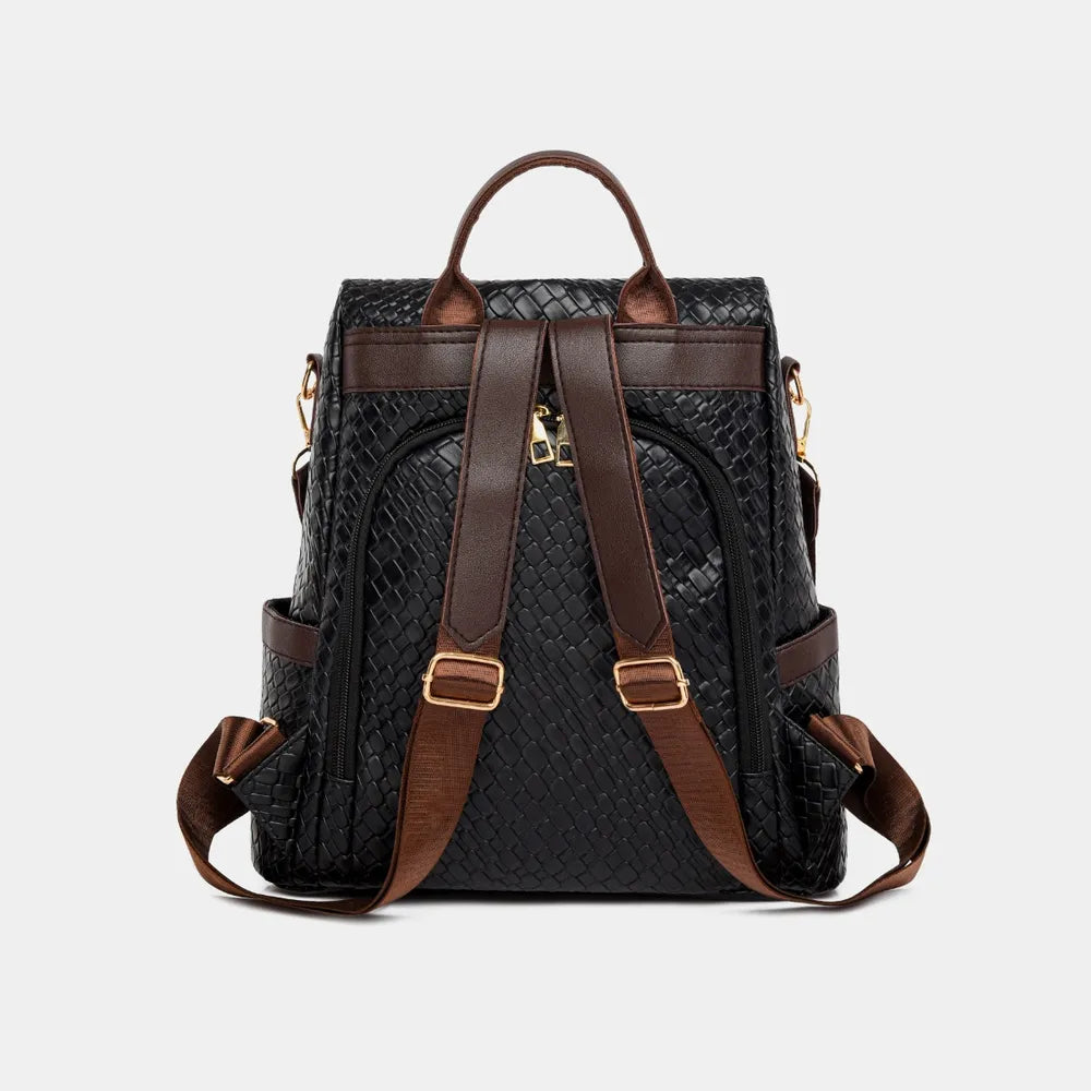 Black woven faux leather convertible backpack with brown straps and gold hardware.