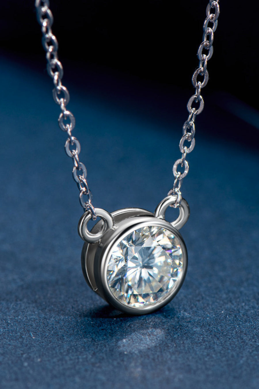Silver solitaire moissanite bezel necklace with delicate chain