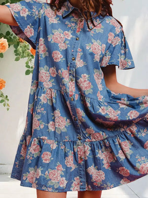 Light blue floral denim mini dress with ruffled tiers and button front.