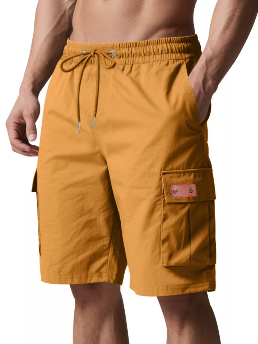 Mustard adjustable cargo shorts with drawstring waist and side cargo pockets.