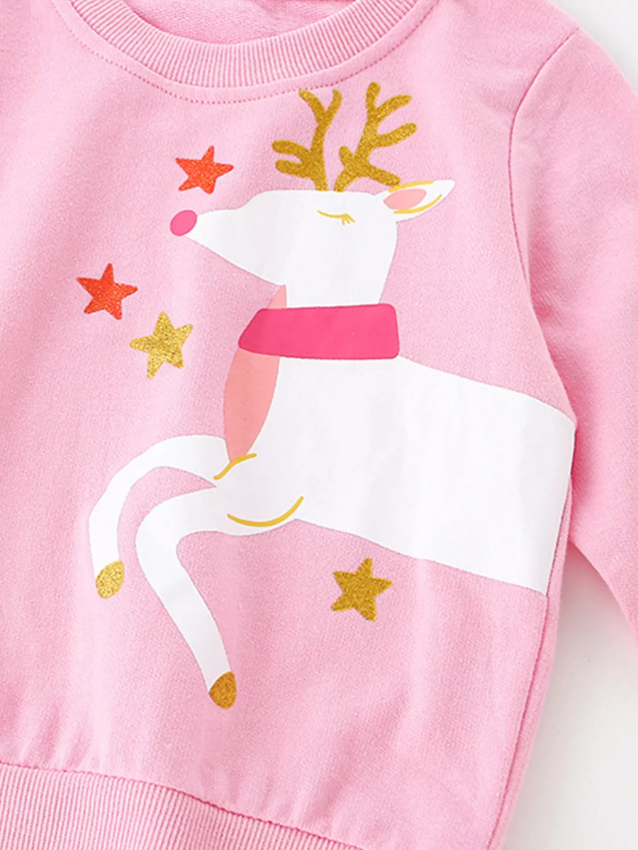 Pink crew neck sweatshirt with a white reindeer graphic and gold stars.