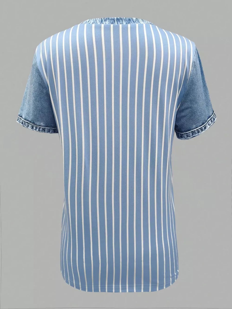 Light blue striped shirt with denim patchwork short sleeves and collar.