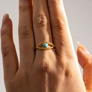 Turquoise, 18K Gold-Plated, Stainless Steel Care instructions: Avoid wearing dur ring in Gold with fitted silhouette