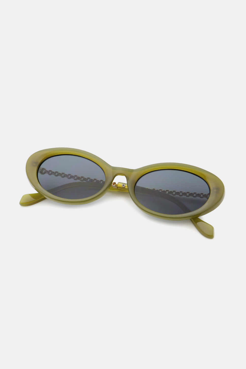 Matcha green oval sunglasses with chain detail and dark lenses.