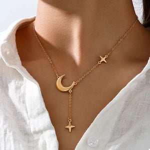 necklace in gold featuring moon charm and straight fit