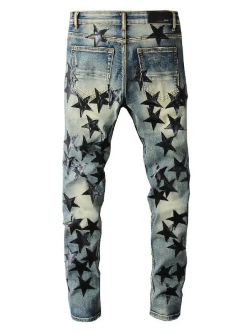 Slim-fit denim jeans in medium wash with all-over black star appliqués.