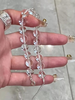 Radiant Crystal Bead Silver Bracelet with adjustable chain and lobster clasp.