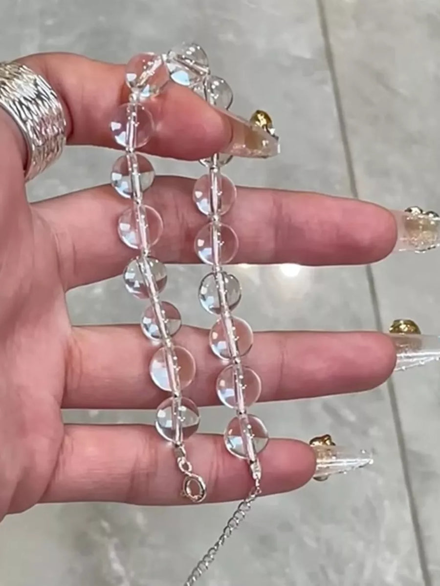 Radiant Crystal Bead Silver Bracelet with adjustable chain and lobster clasp.