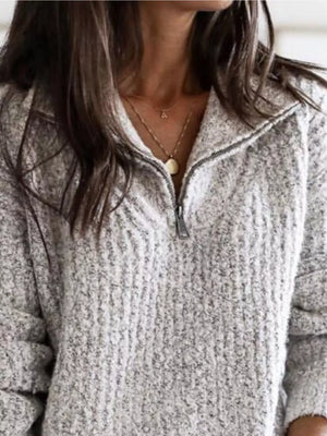 100% polyester Care instructions: Machine wash cold zip-up sweater in cream with relaxed silhouette