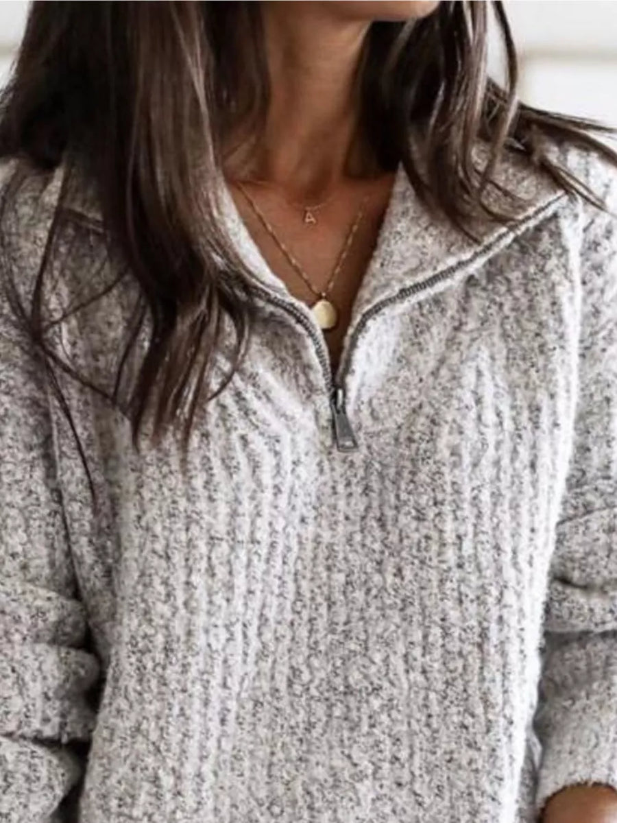 100% polyester Care instructions: Machine wash cold zip-up sweater in cream with relaxed silhouette