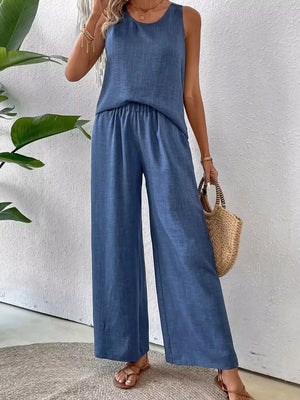 Dark blue round neck sleeveless two-piece ensemble with wide-leg pants and elastic waist.